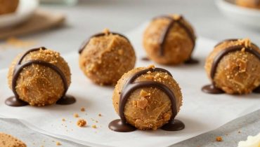 Dessert ohne Backen: Wie diese schokoladenüberzogenen Cheesecake-Erdnussbutter-Häppchen den Gourmet-Aperitif revolutionieren Dessert ohne Backen: Wie diese schokoladenüberzogenen Cheesecake-Erdnussbutter-Häppchen den Gourmet-Aperitif revolutionieren