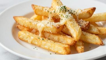Pommes mit Käsekruste: Die einfache Technik, die die Beilage in ein Gourmetgericht mit 350 Kalorien verwandelt Pommes mit Käsekruste: Die einfache Technik, die die Beilage in ein Gourmetgericht mit 350 Kalorien verwandelt